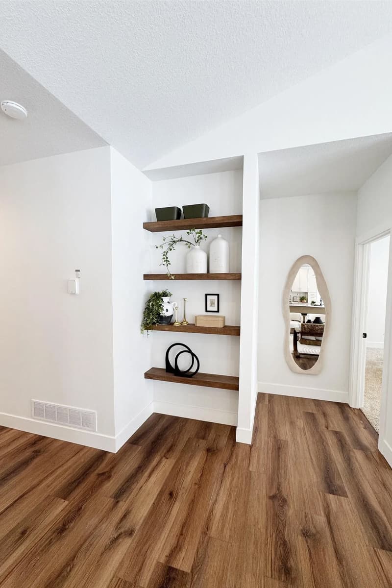 Decorated shelves at entry way
